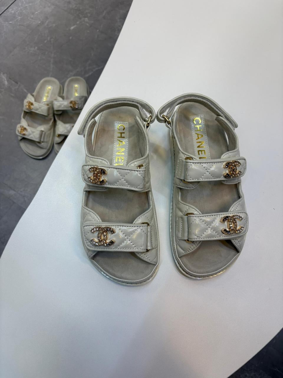 Chanel slippers & Chanel sandals. Grey