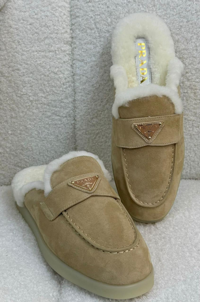 Prada mules with fur