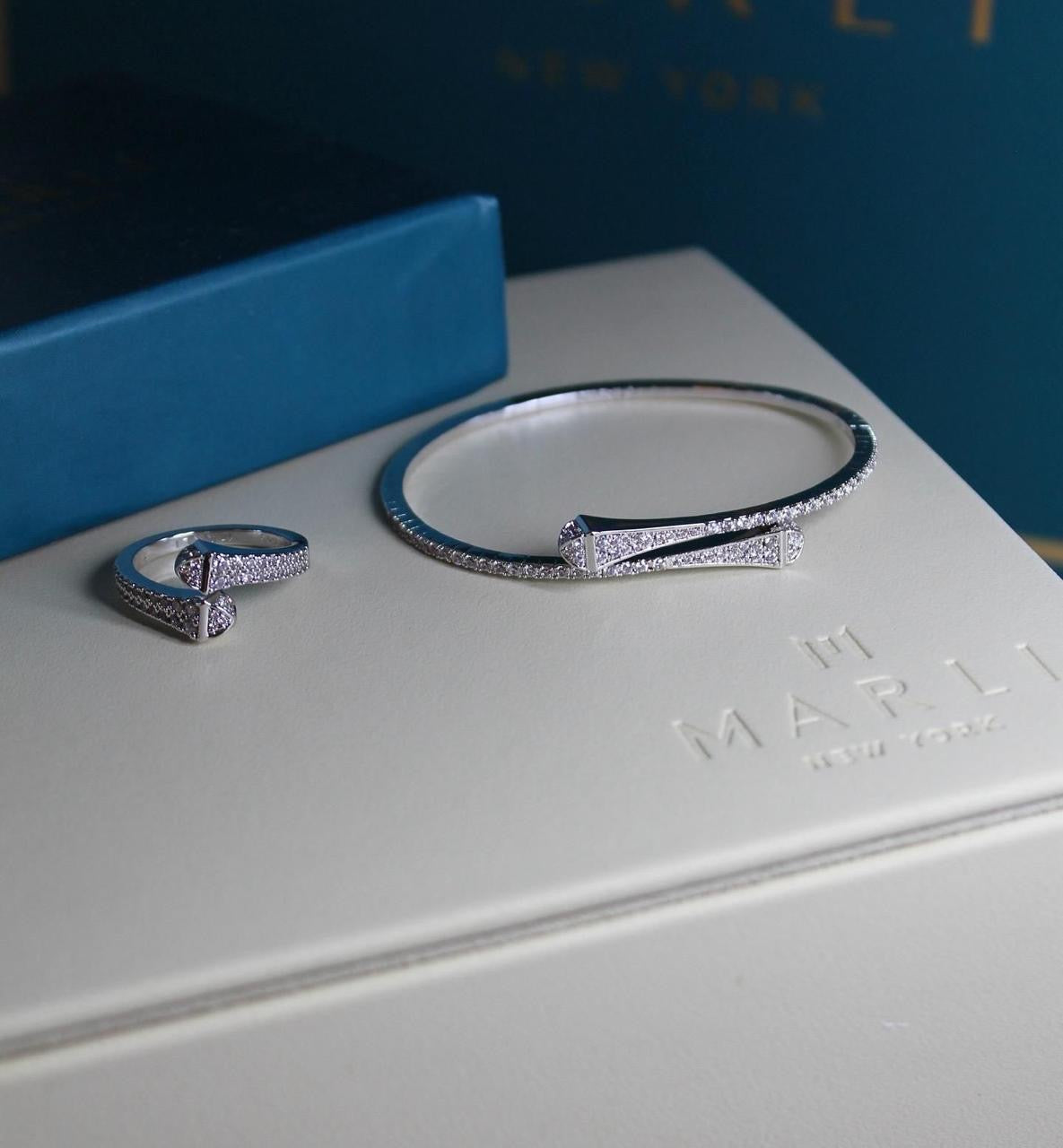 Marli jewelry set ( bracelet & ring )
