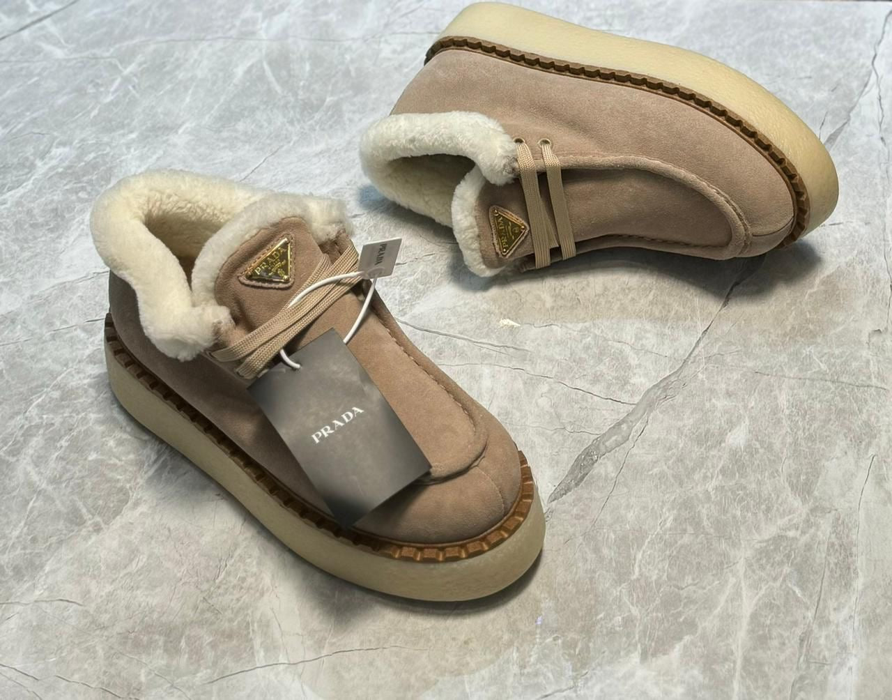 Prada loafers with fur