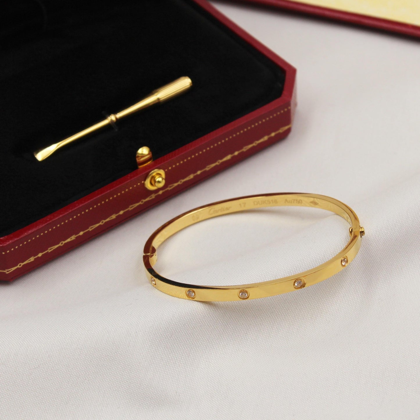 Cartier bangle - 10 stones with screw