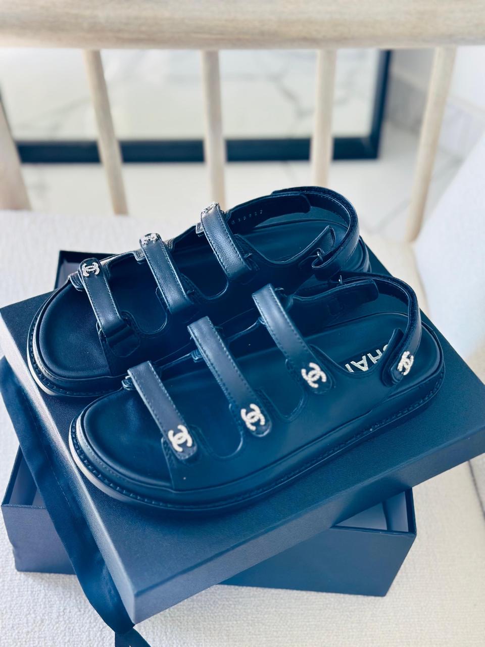 Chanel sandals.