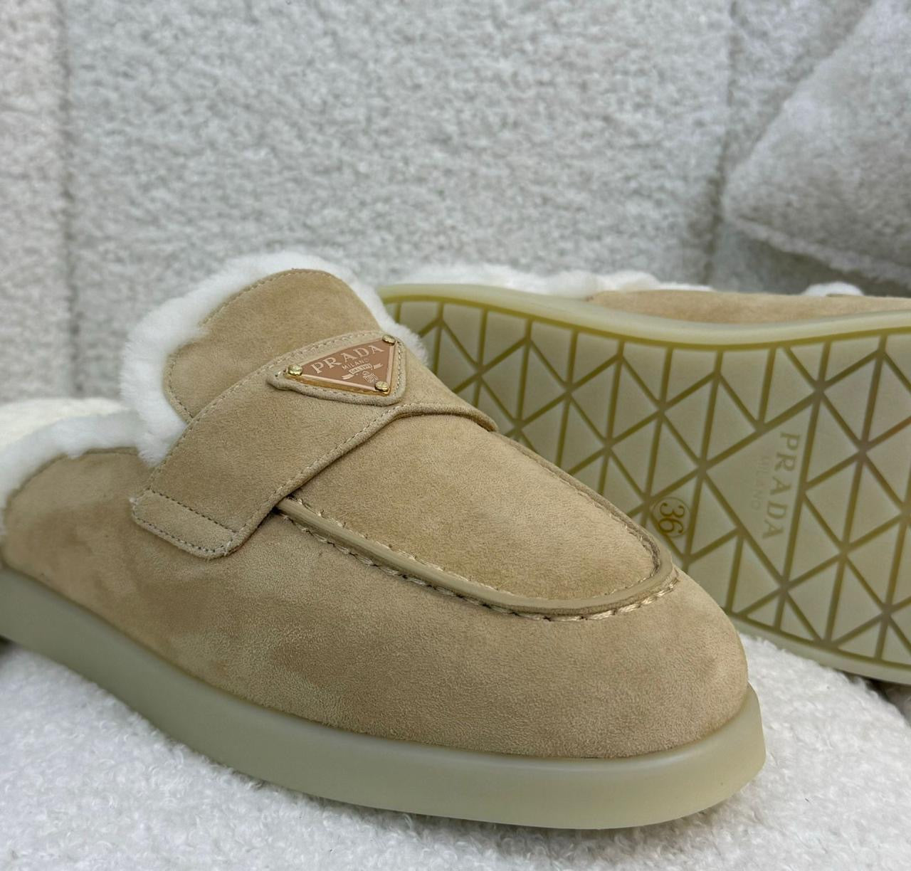 Prada mules with fur