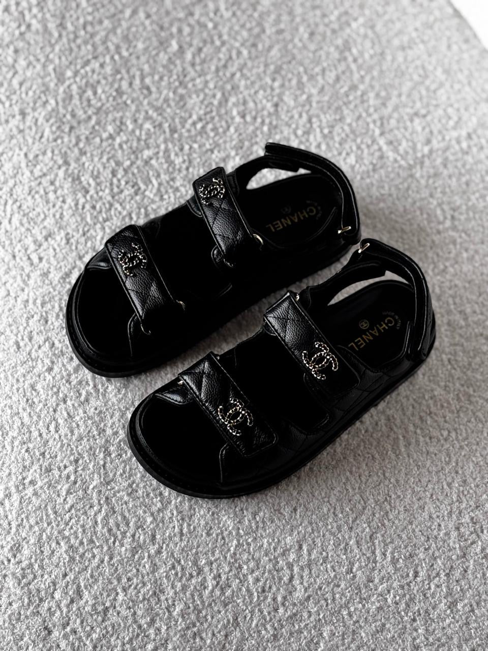 Chanel sandals.