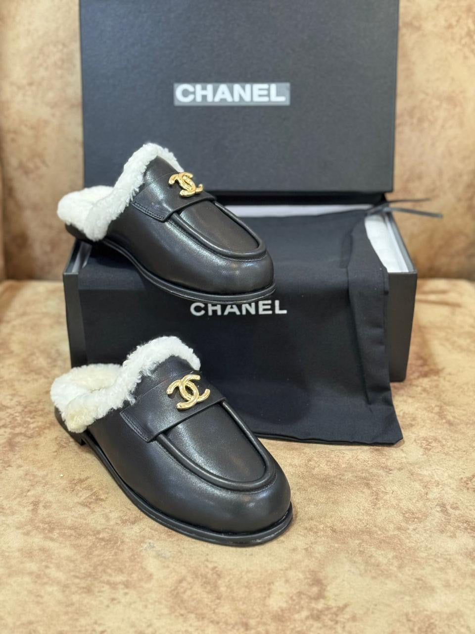 Chanel mules with fur