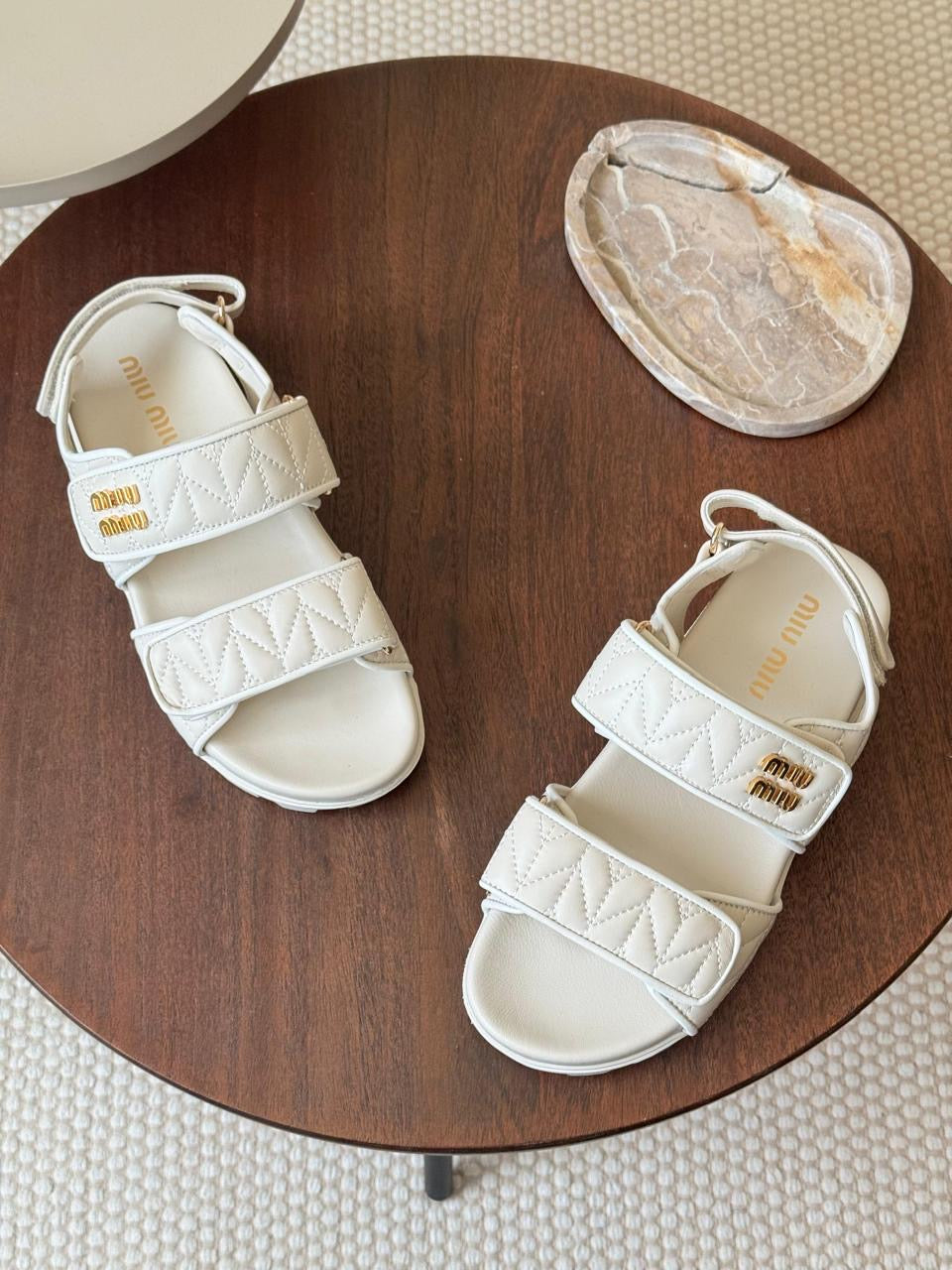 Miu miu sandals.