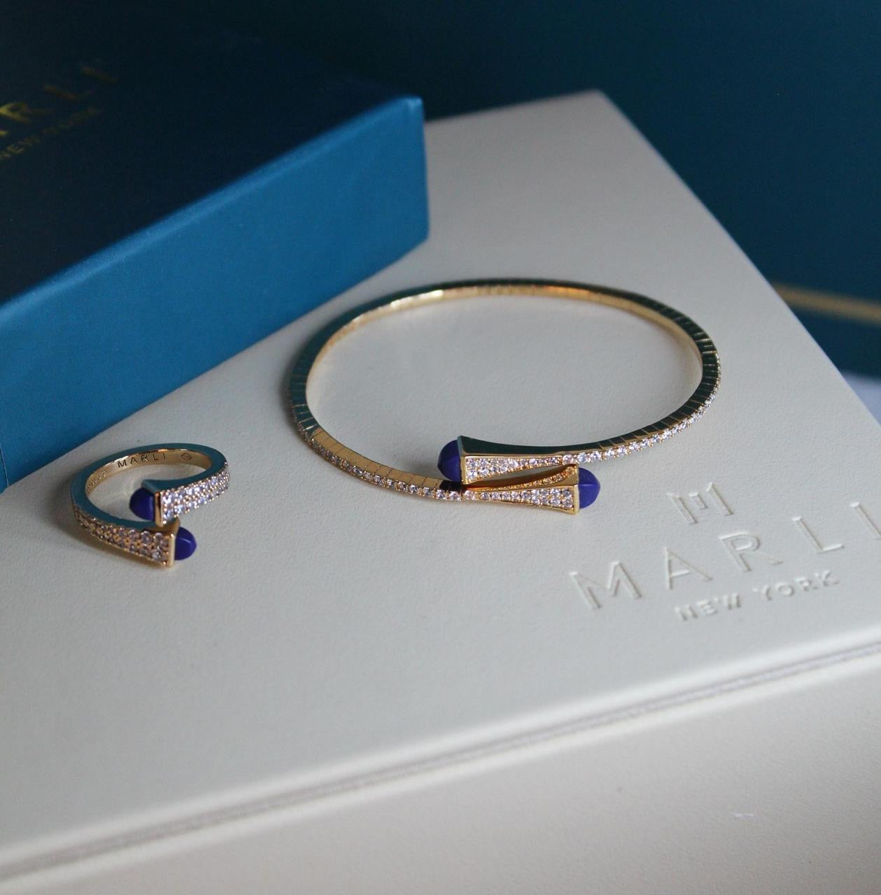 Marli jewelry set ( bracelet & ring )