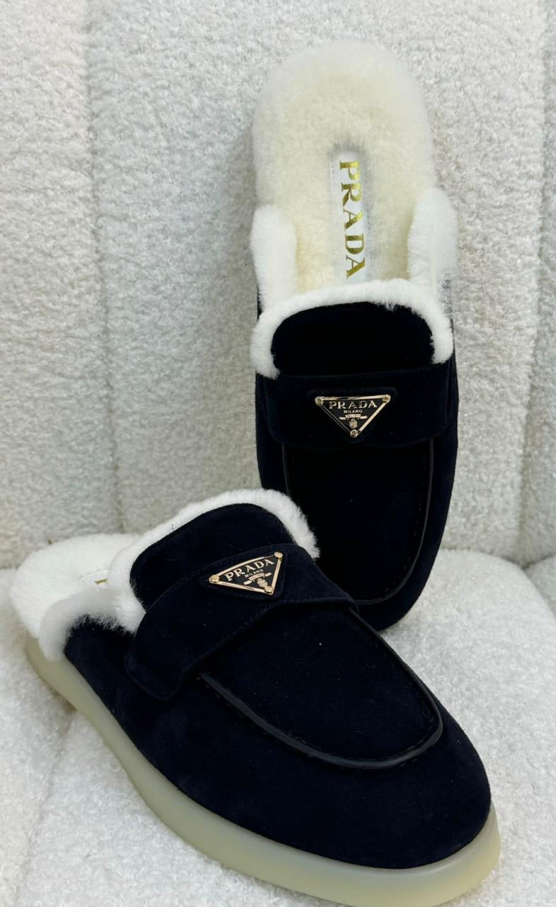 Prada mules with fur
