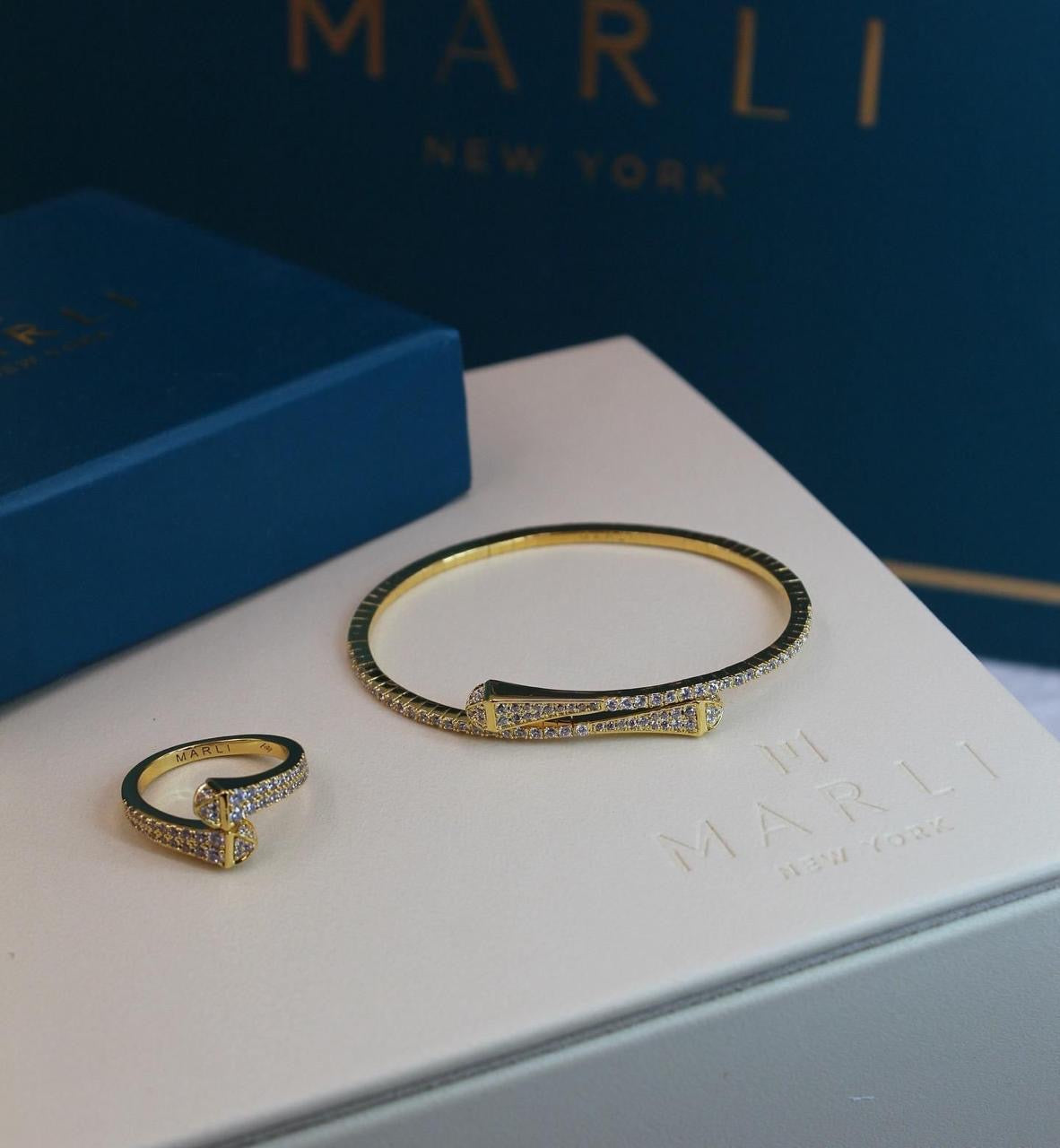 Marli jewelry set ( bracelet & ring )