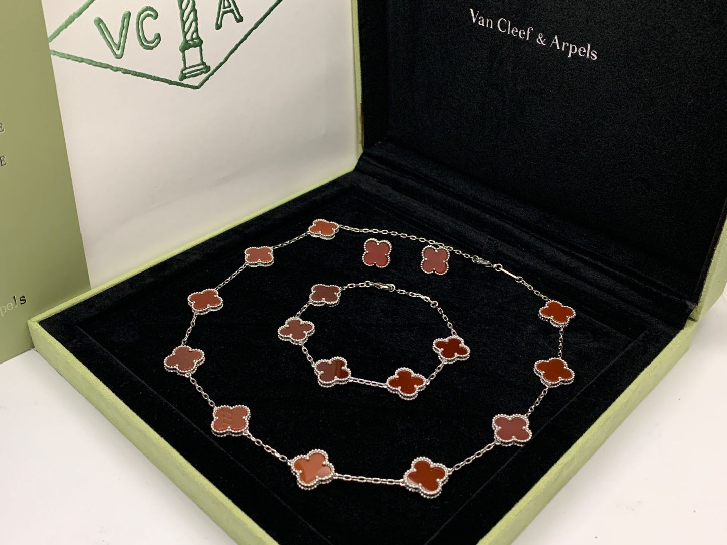 Van cleef jewelry set silver color
