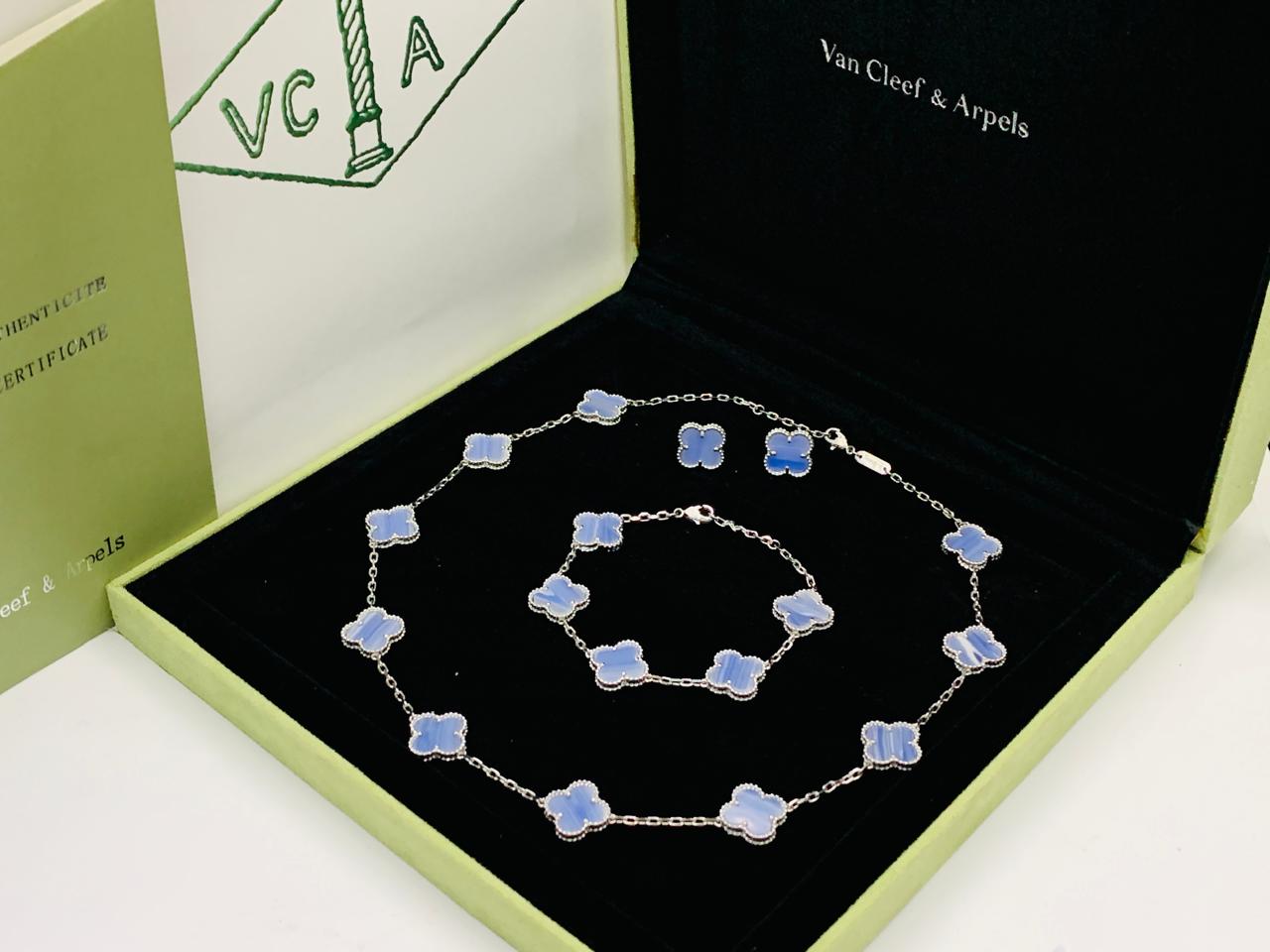 Van cleef jewelry set silver color