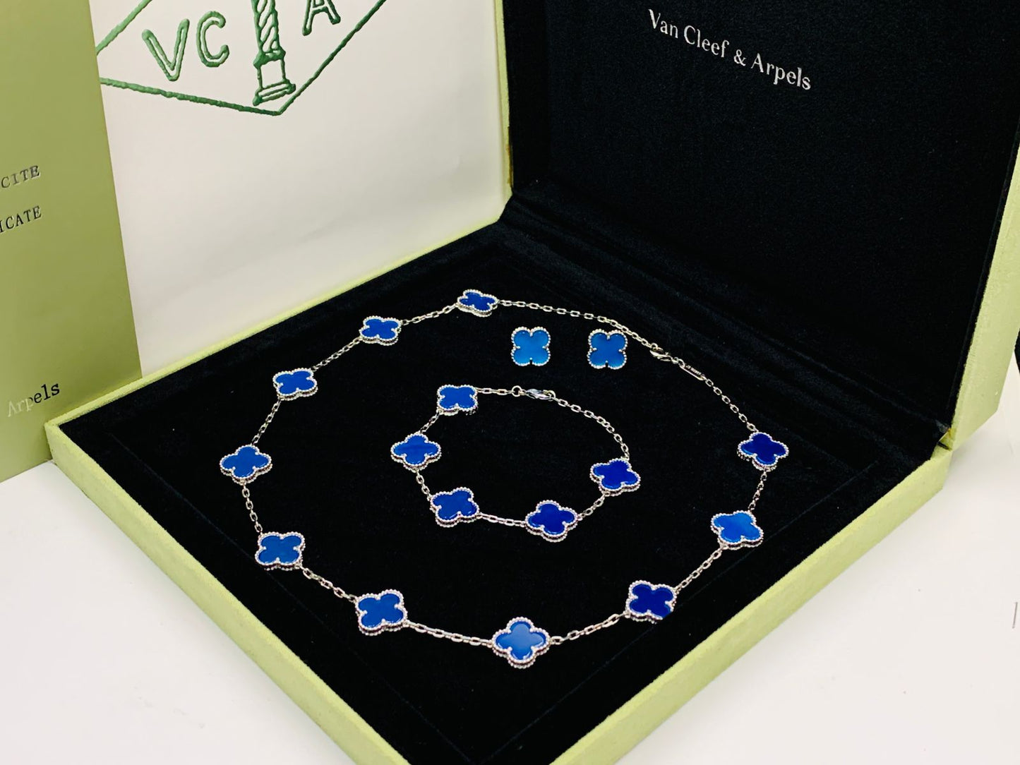 Van cleef jewelry set silver color