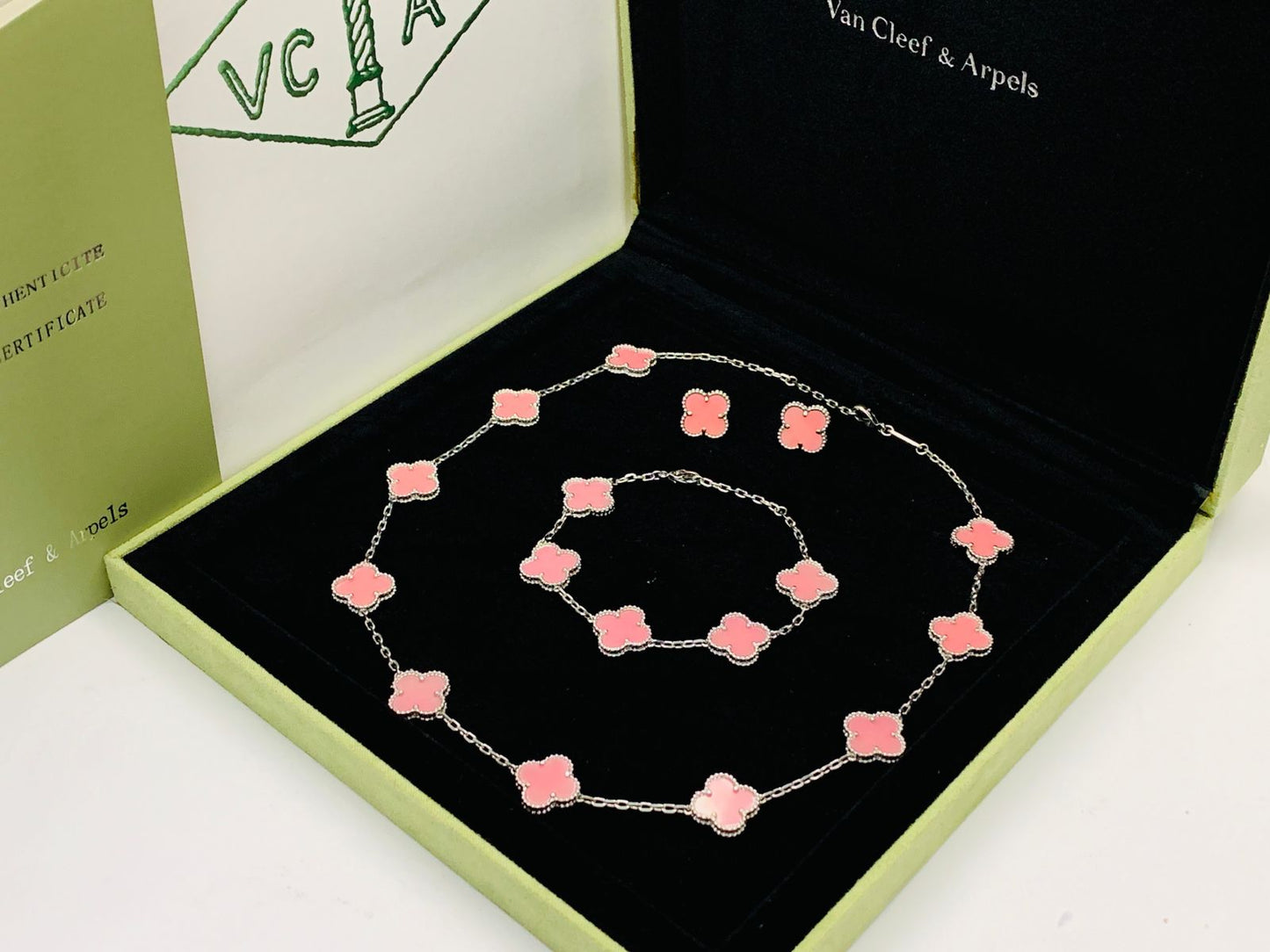 Van cleef jewelry set silver color