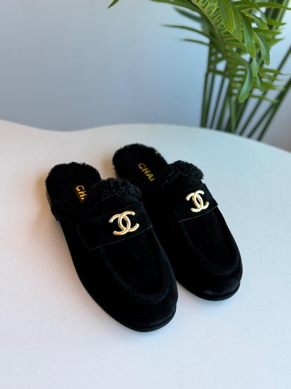 Chanel mules with fur