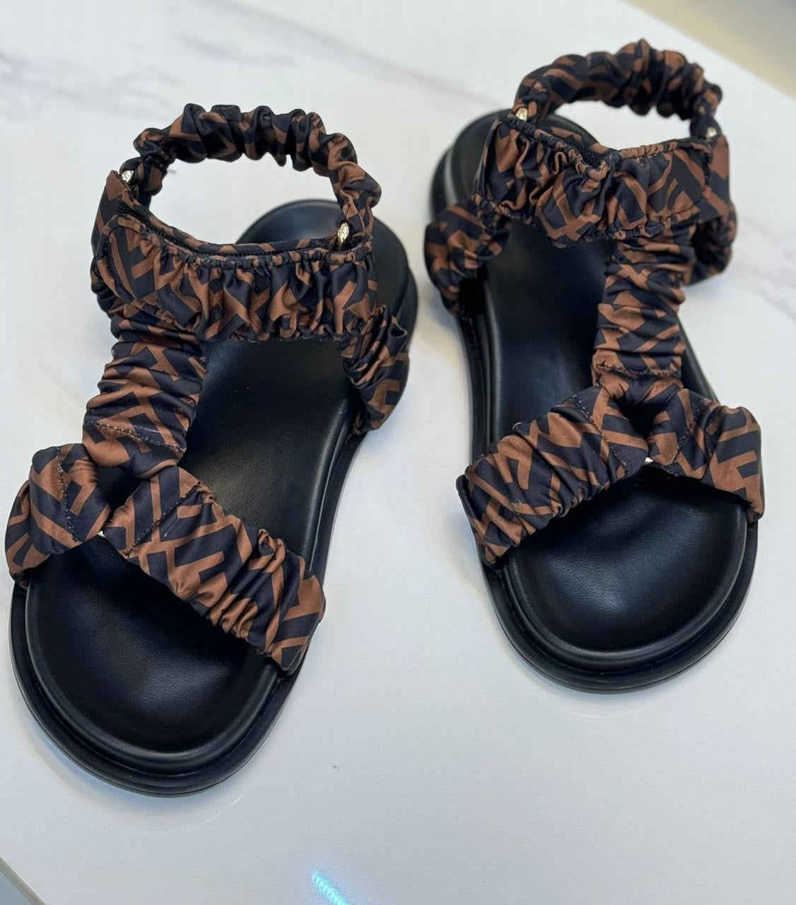 Fendi sandals.