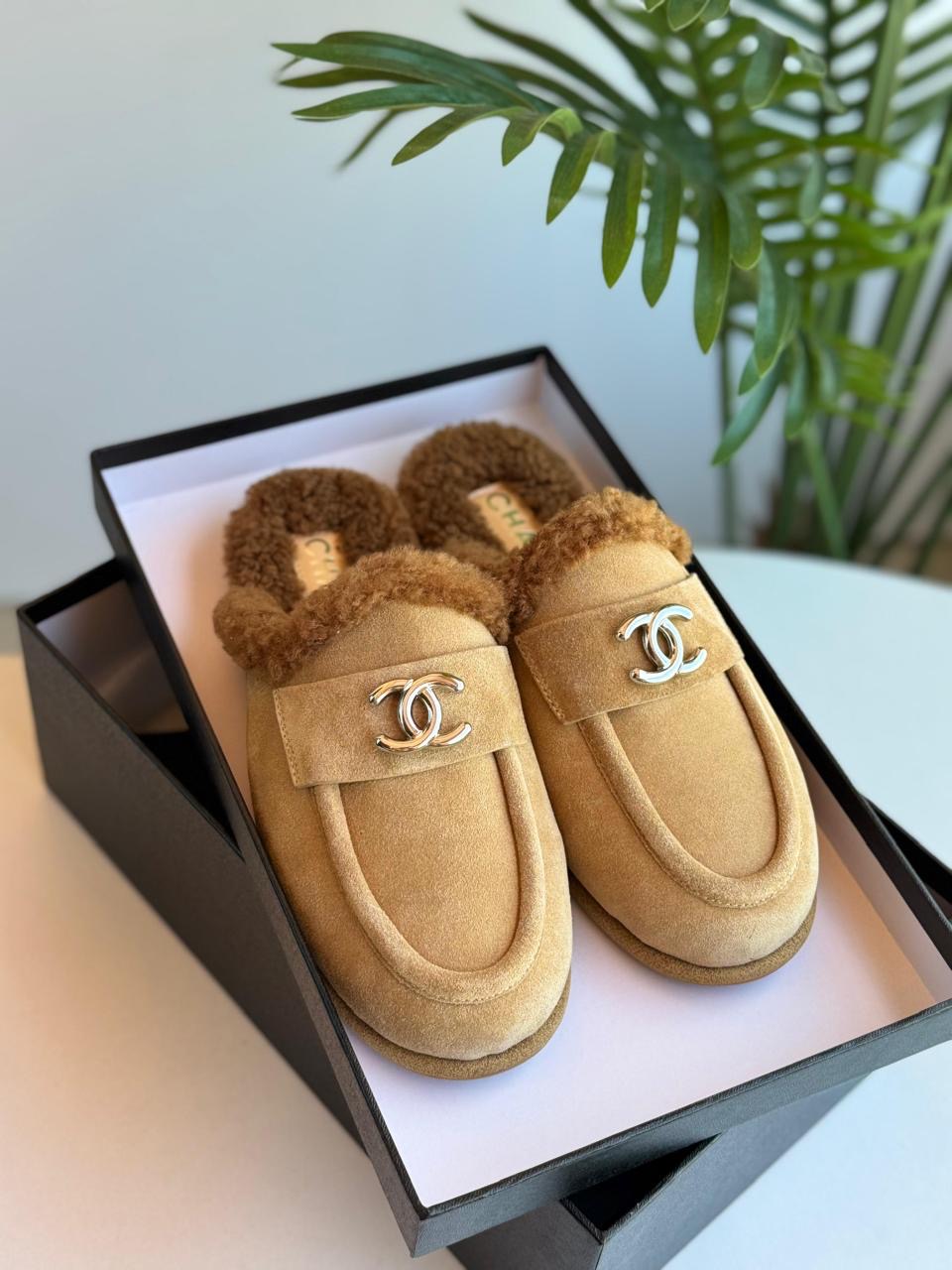 Chanel mules with fur