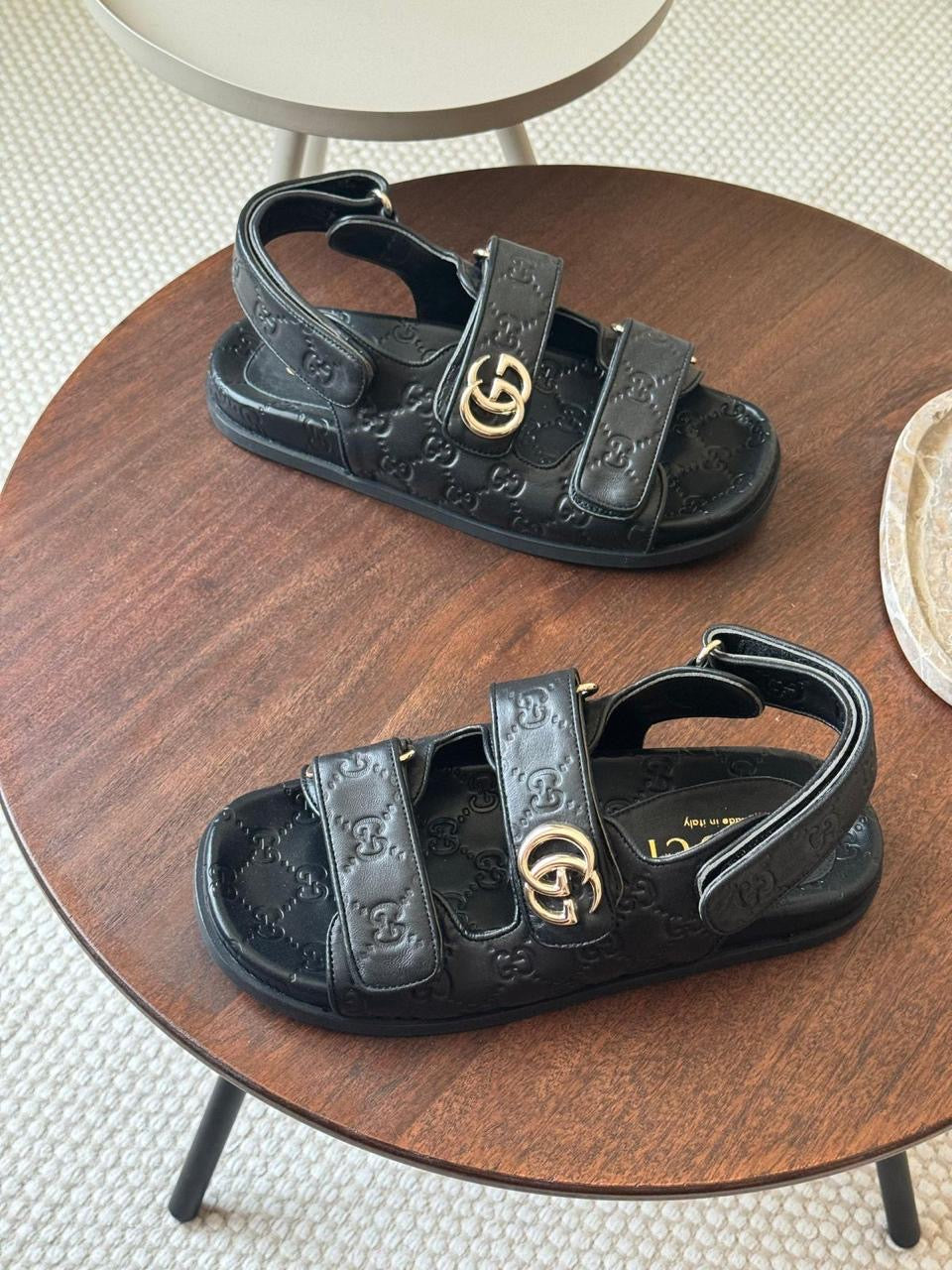 Gucci sandals.
