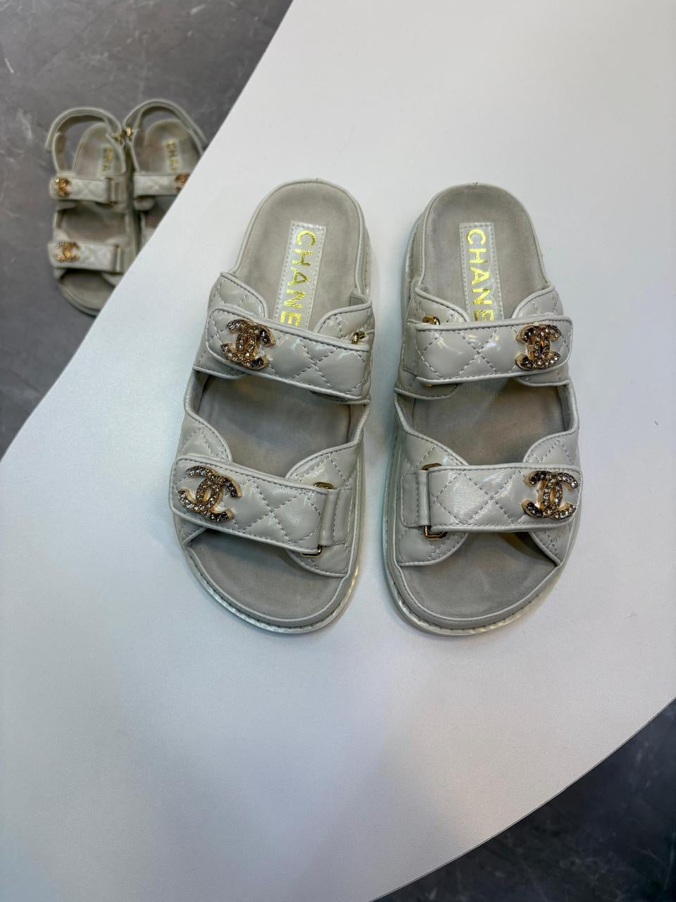 Chanel slippers & Chanel sandals. Grey