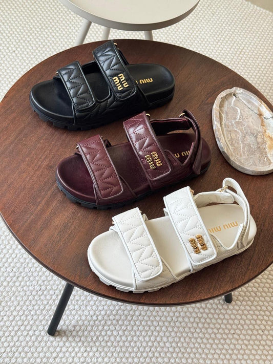 Miu miu sandals.