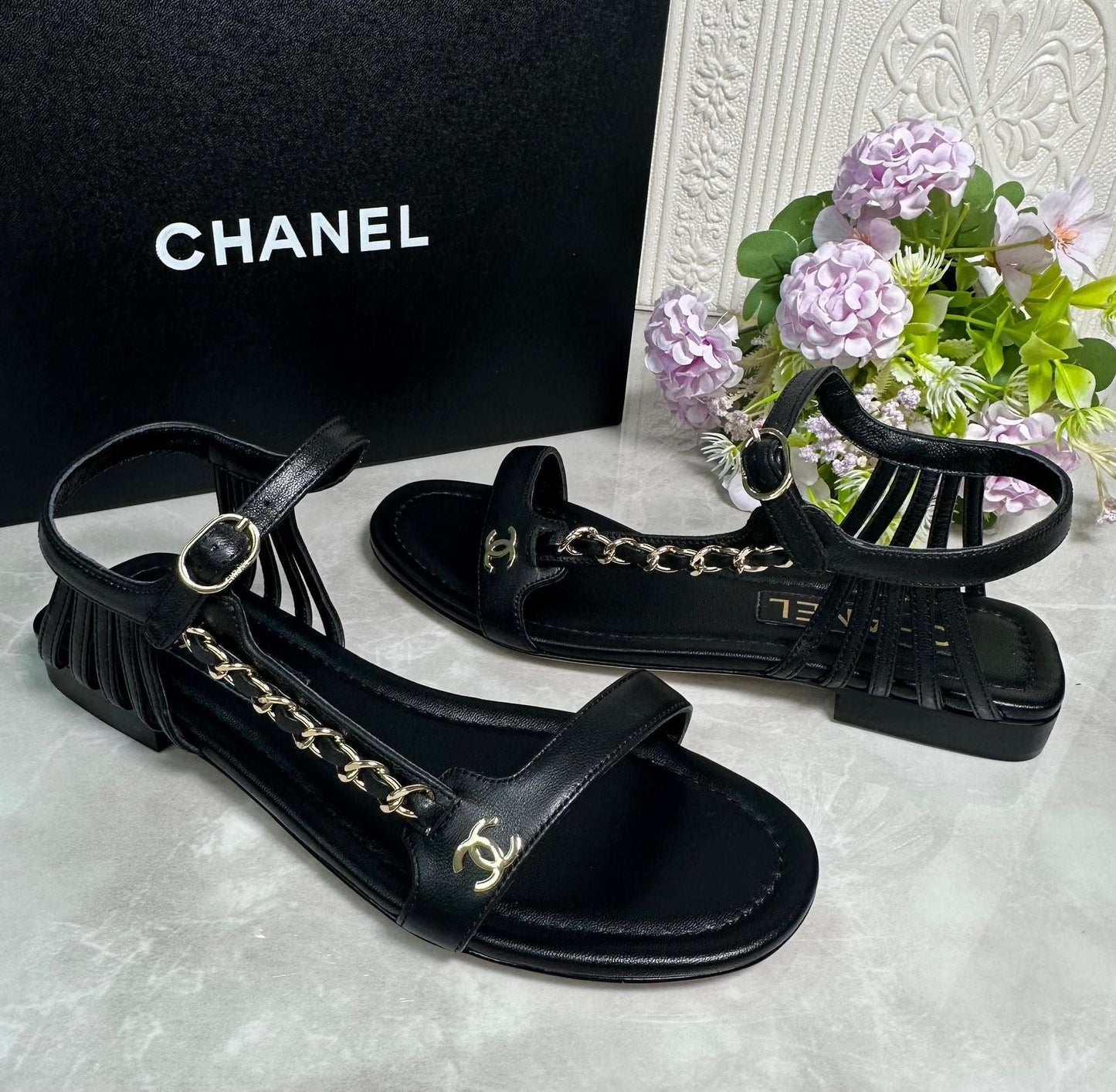 Chanel sandals.