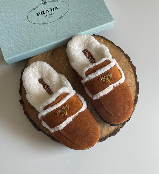 Prada mules with fur