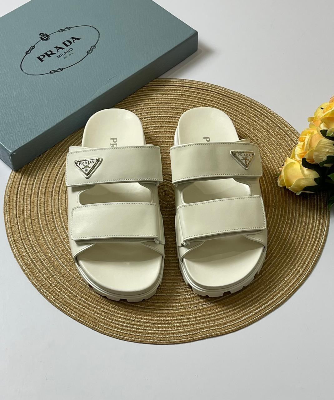Prada slippers white