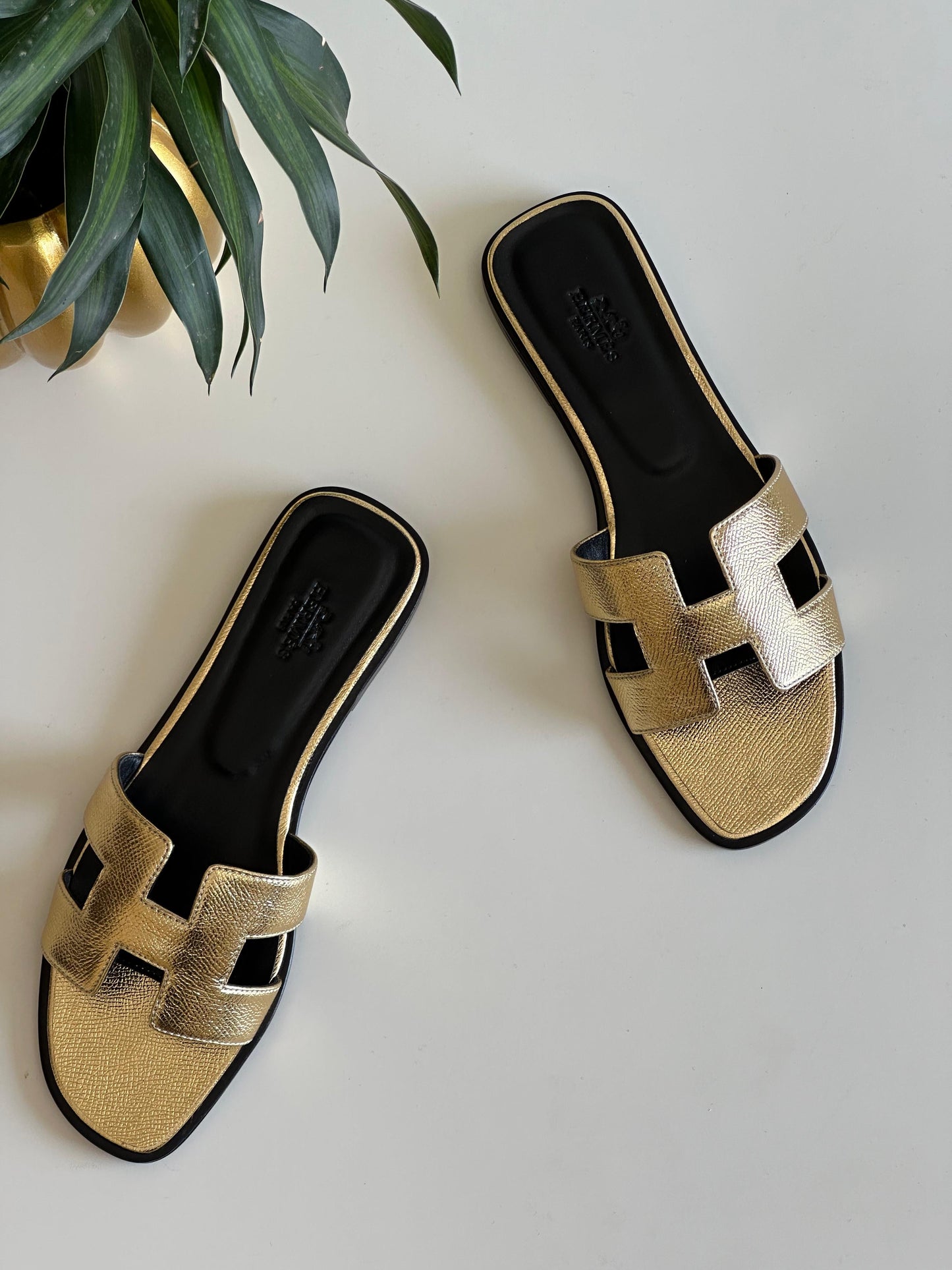 Hermes slippers and sandals gold