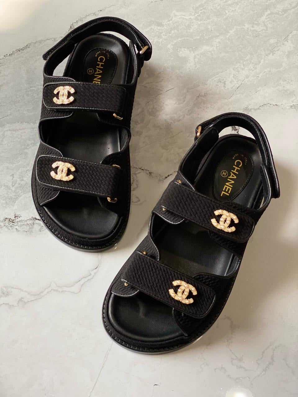 Chanel sandals.