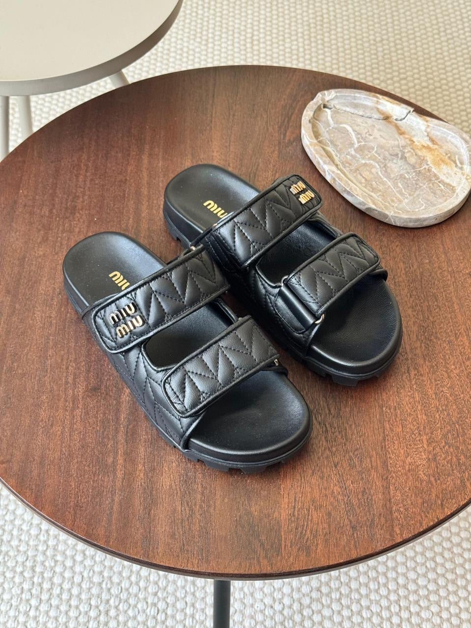 Miu miu sandals.
