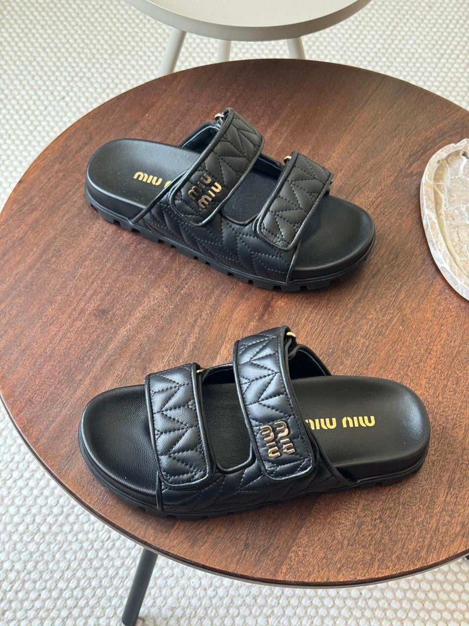 Miu miu sandals.