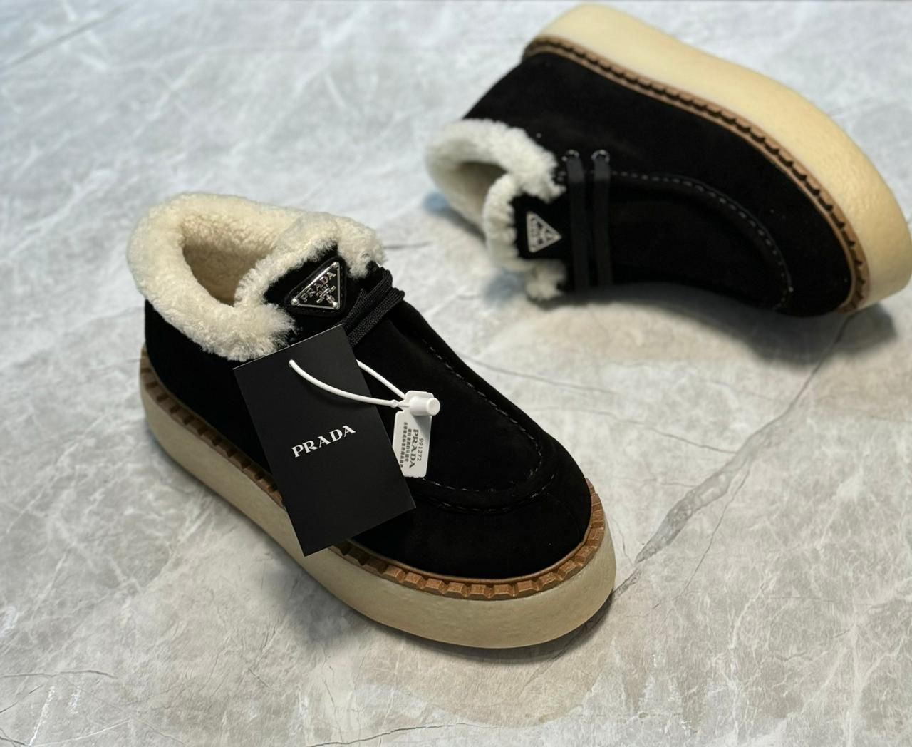 Prada loafers with fur