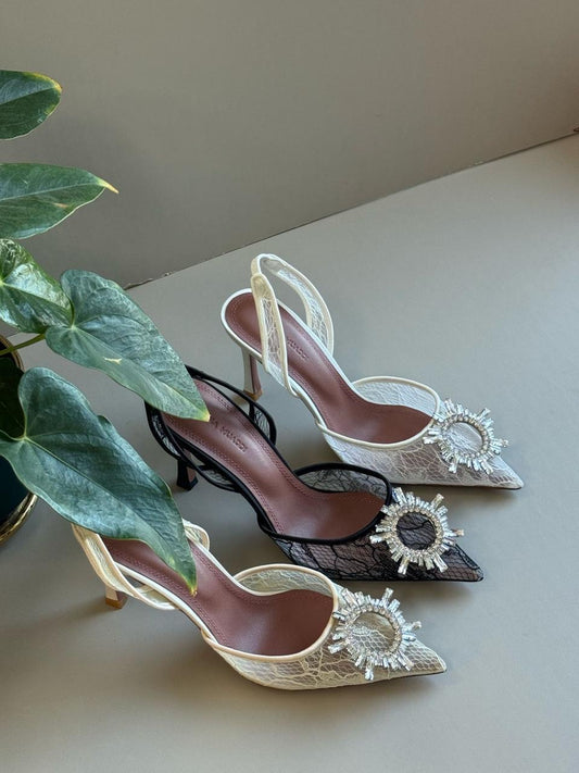 Amina muadi heels