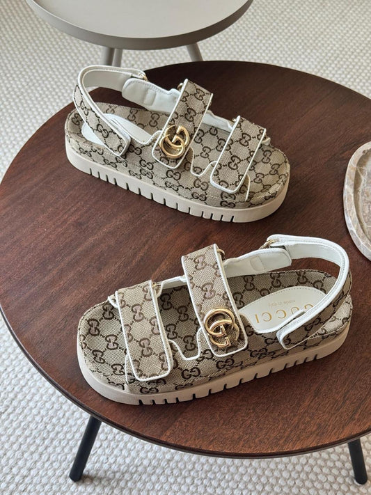 Gucci sandals.