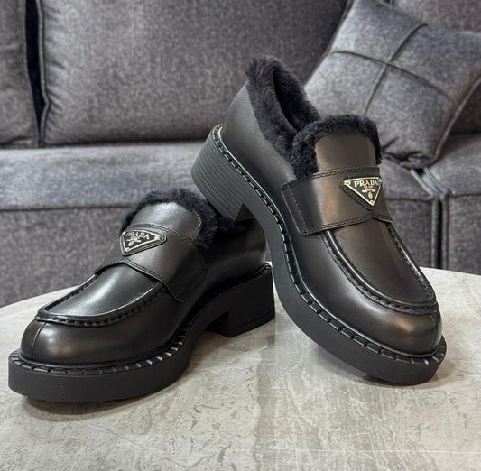 Prada loafers with fur
