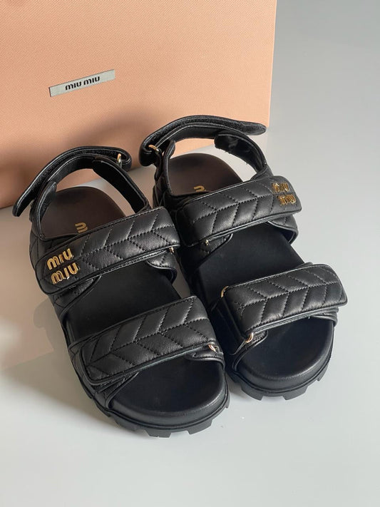 Miu miu sandals.