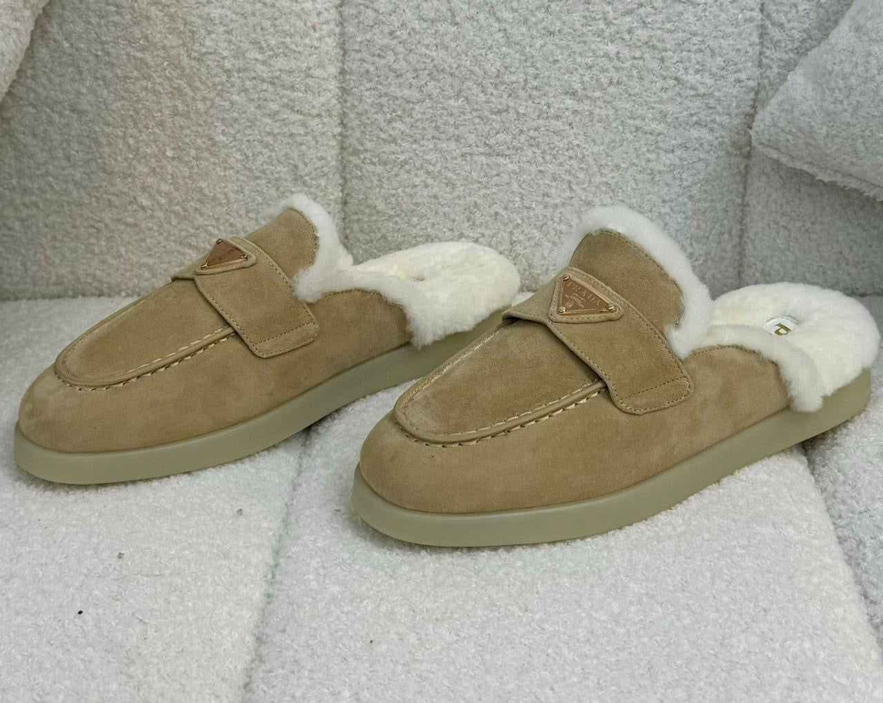 Prada mules with fur