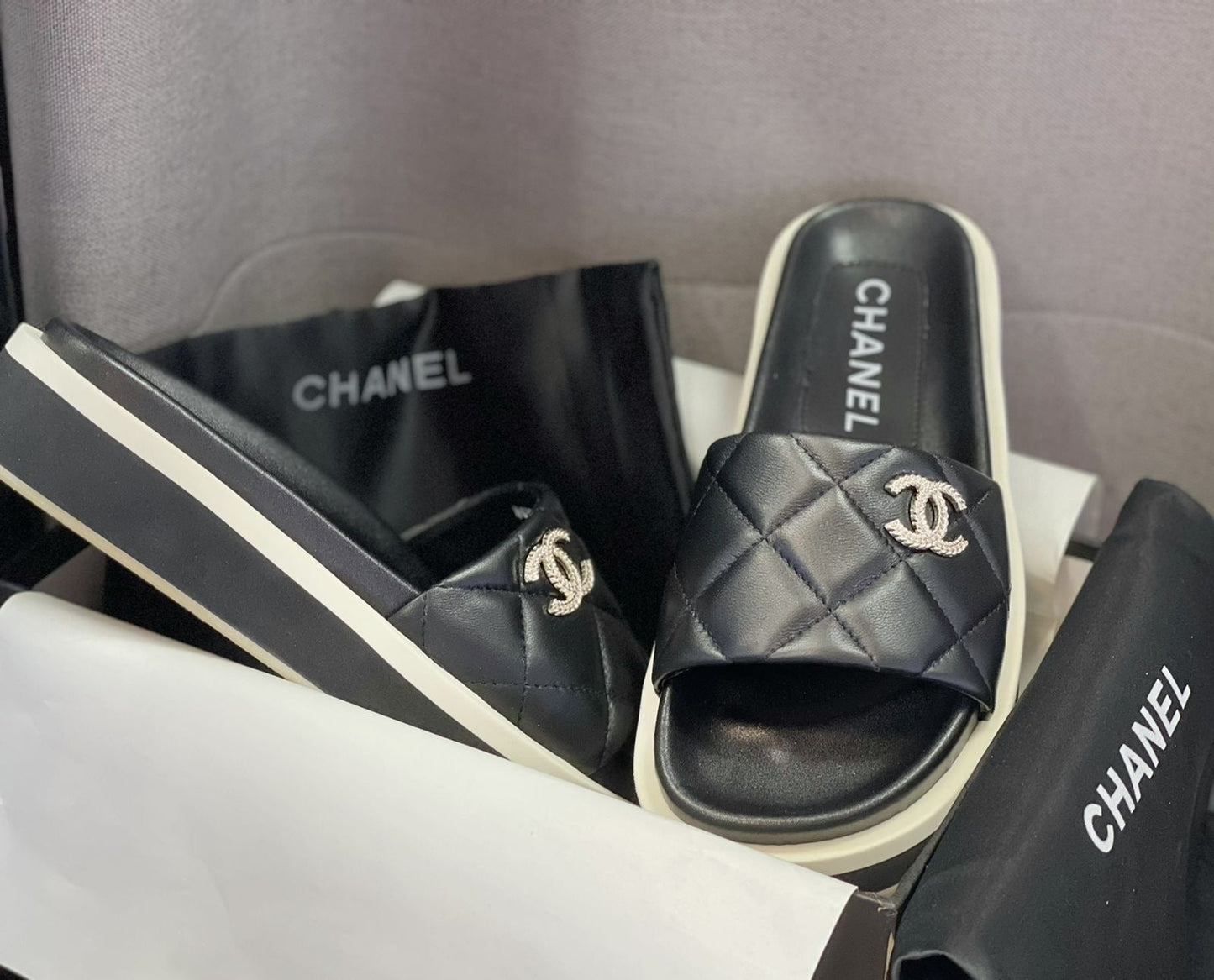 Chanel slippers black and white