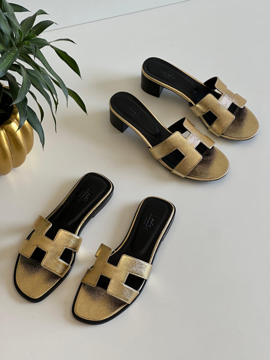 Hermes slippers and sandals gold