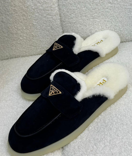 Prada mules with fur