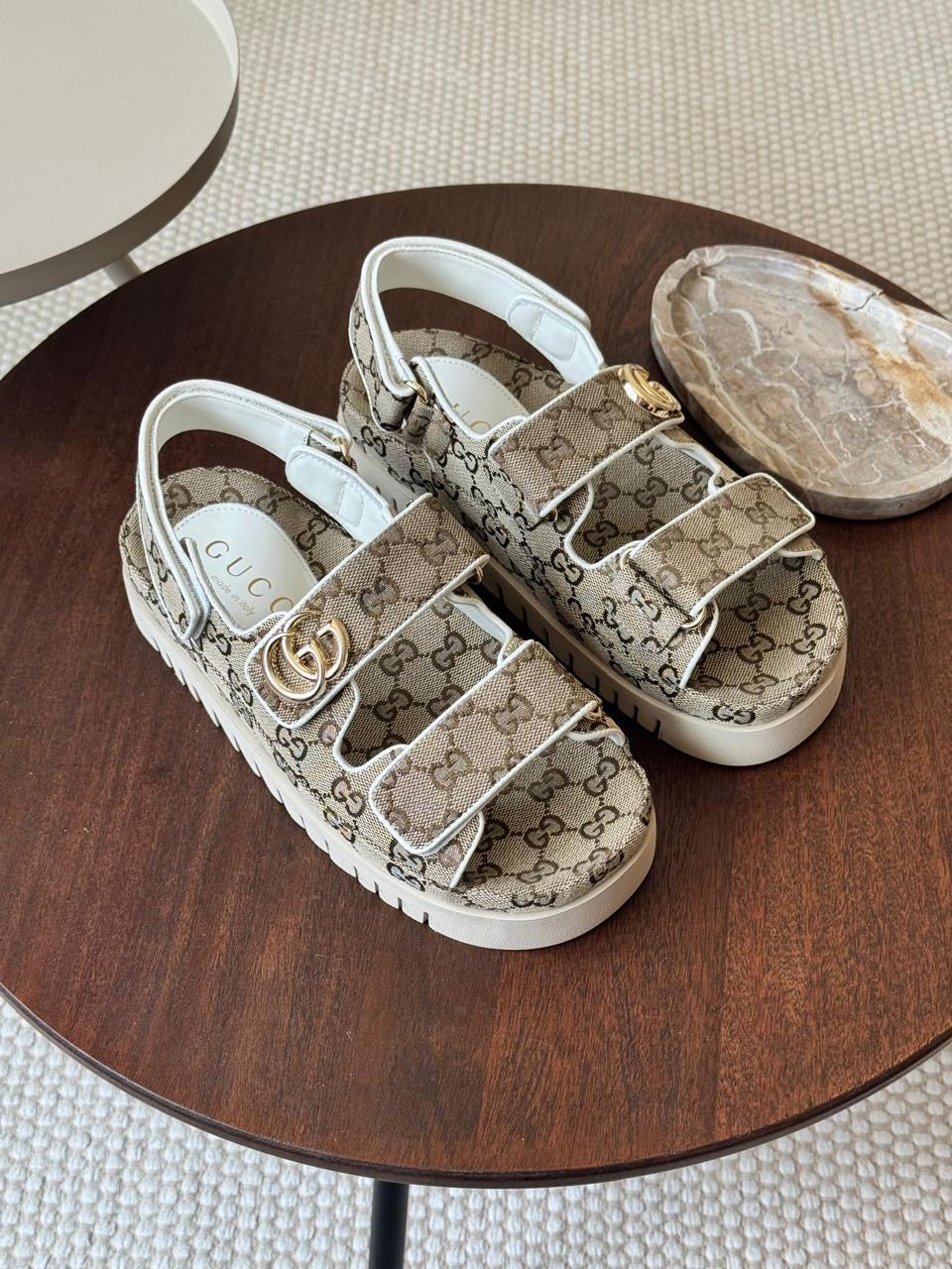 Gucci sandals.