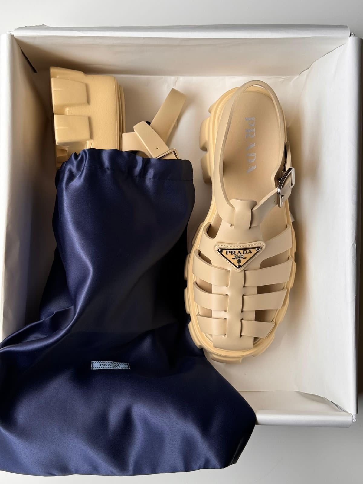 Prada sandals.