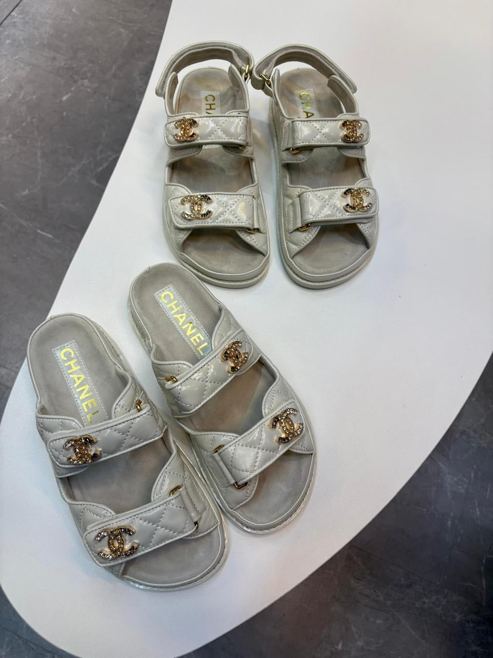Chanel slippers & Chanel sandals. Grey