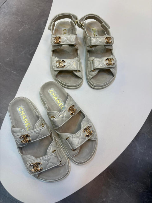Chanel slippers & Chanel sandals. Grey