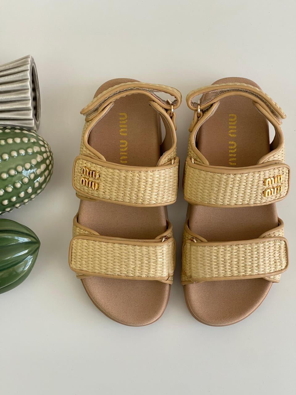 Miu miu sandals.