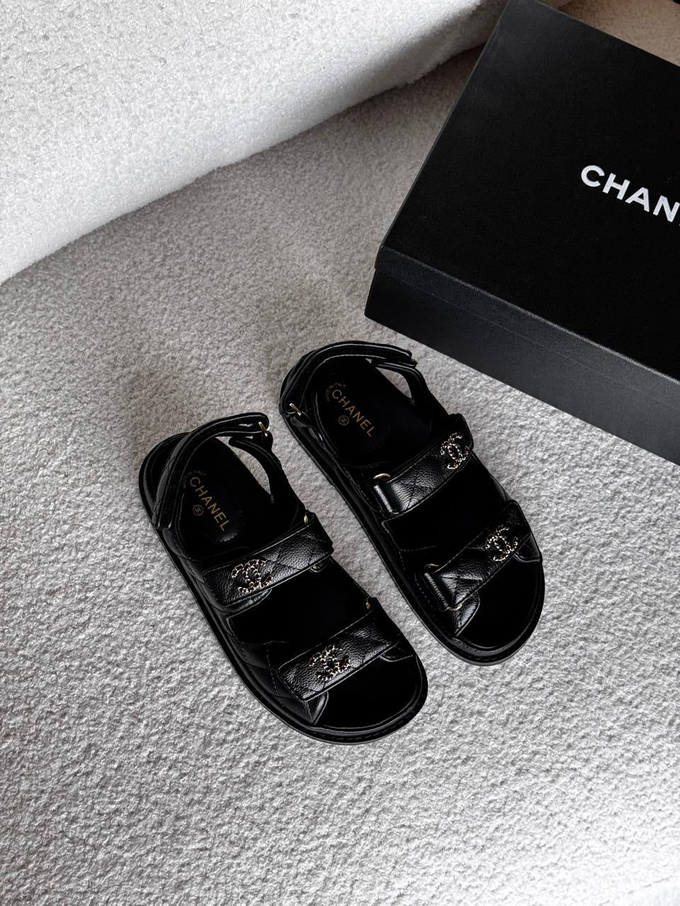 Chanel sandals.