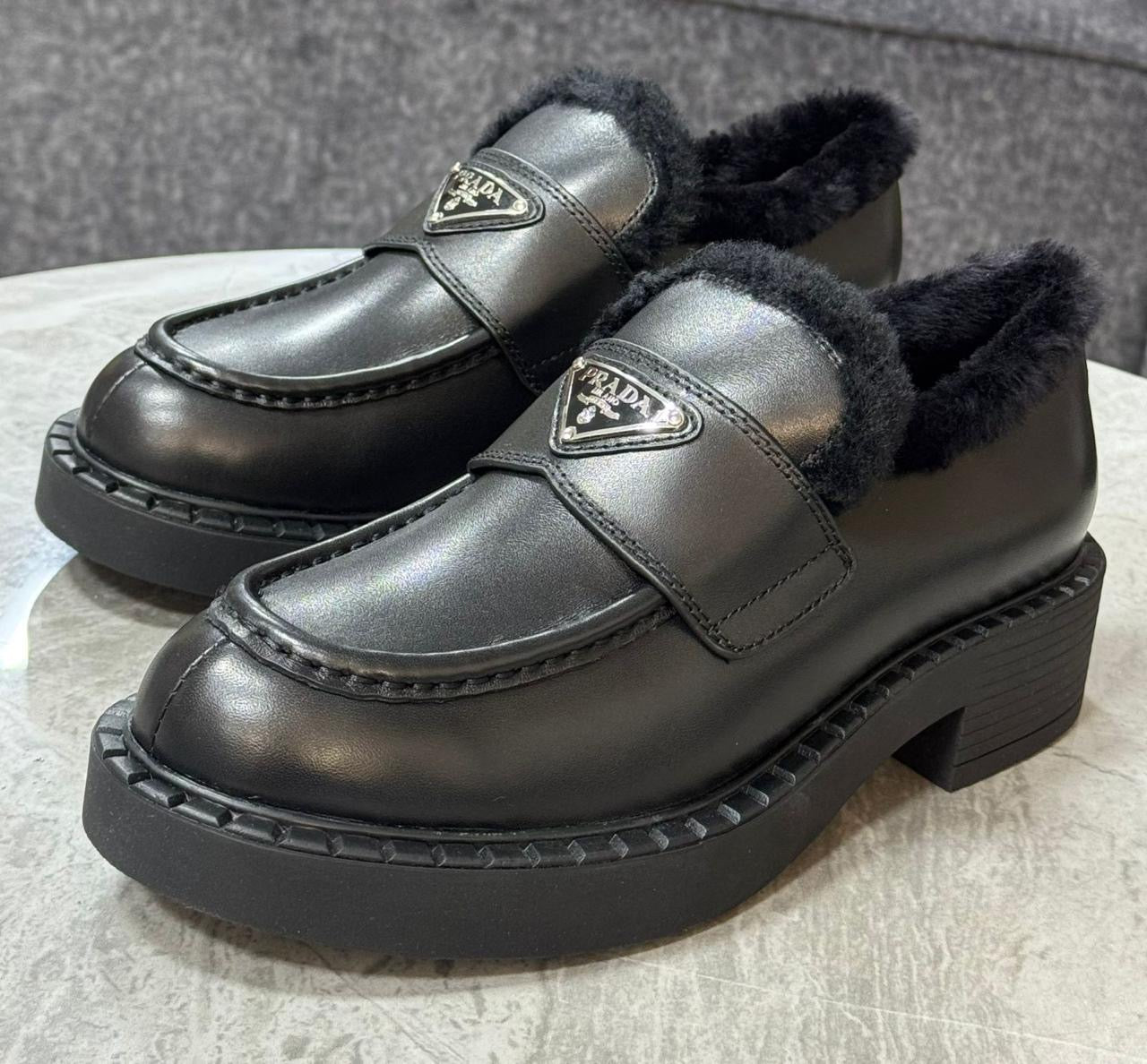 Prada loafers with fur