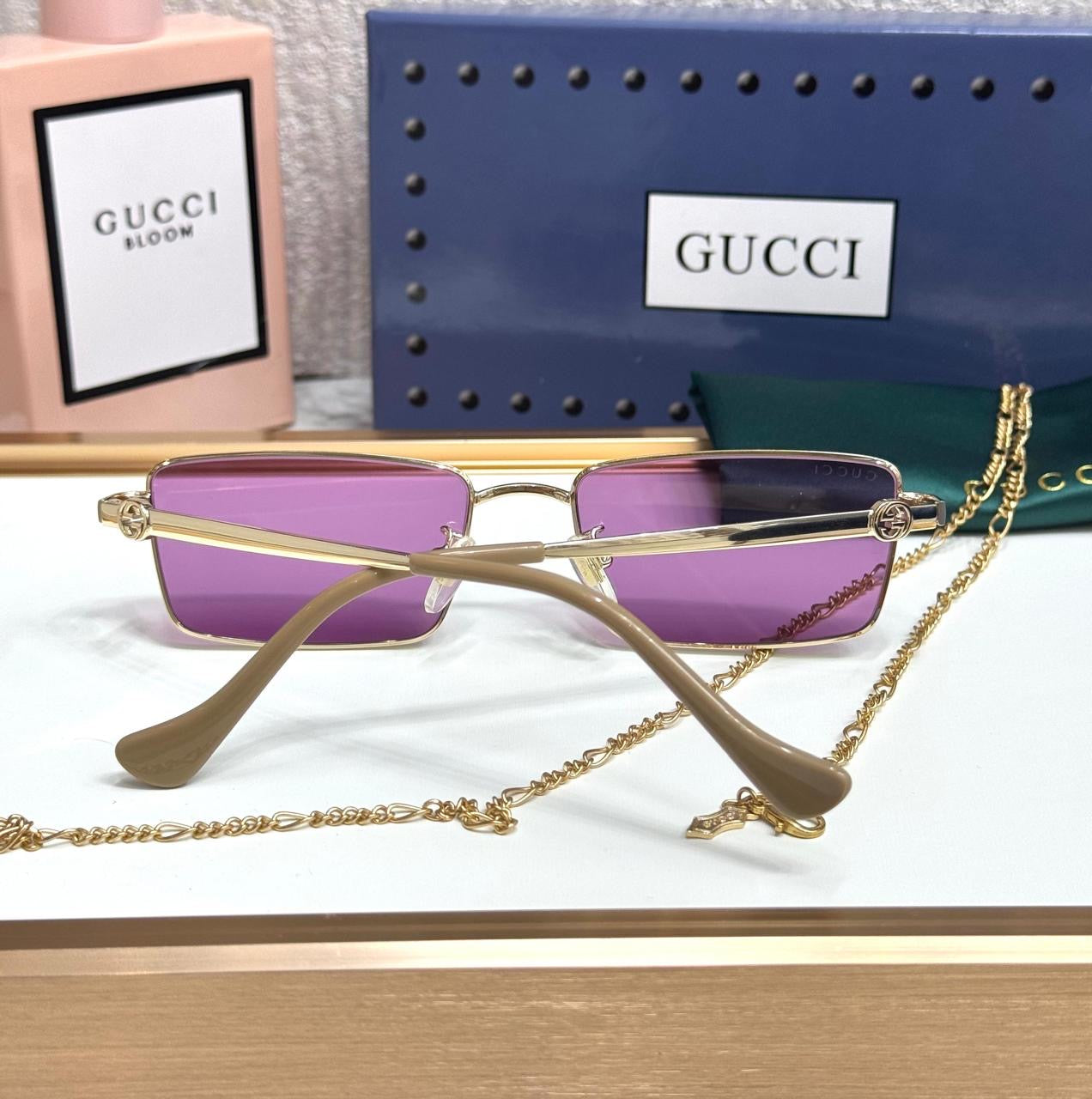 Gucci sunglasses with chain