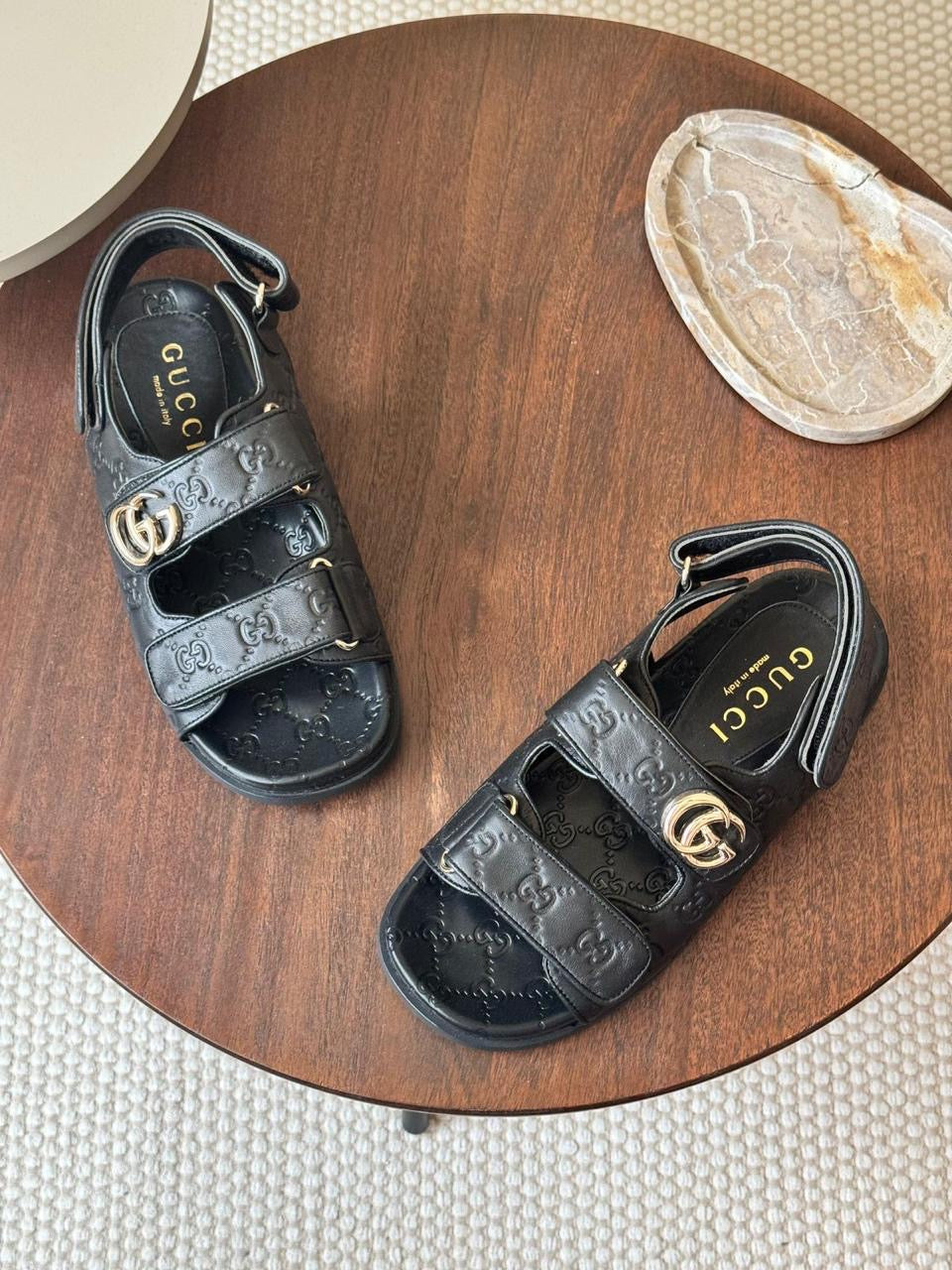 Gucci sandals.