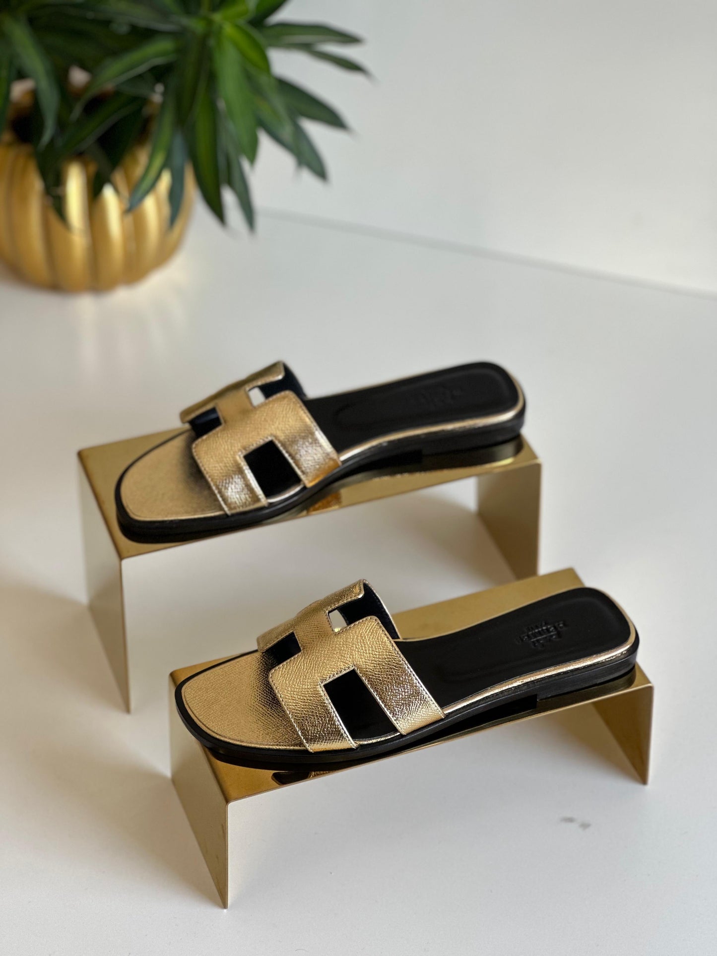 Hermes slippers and sandals gold