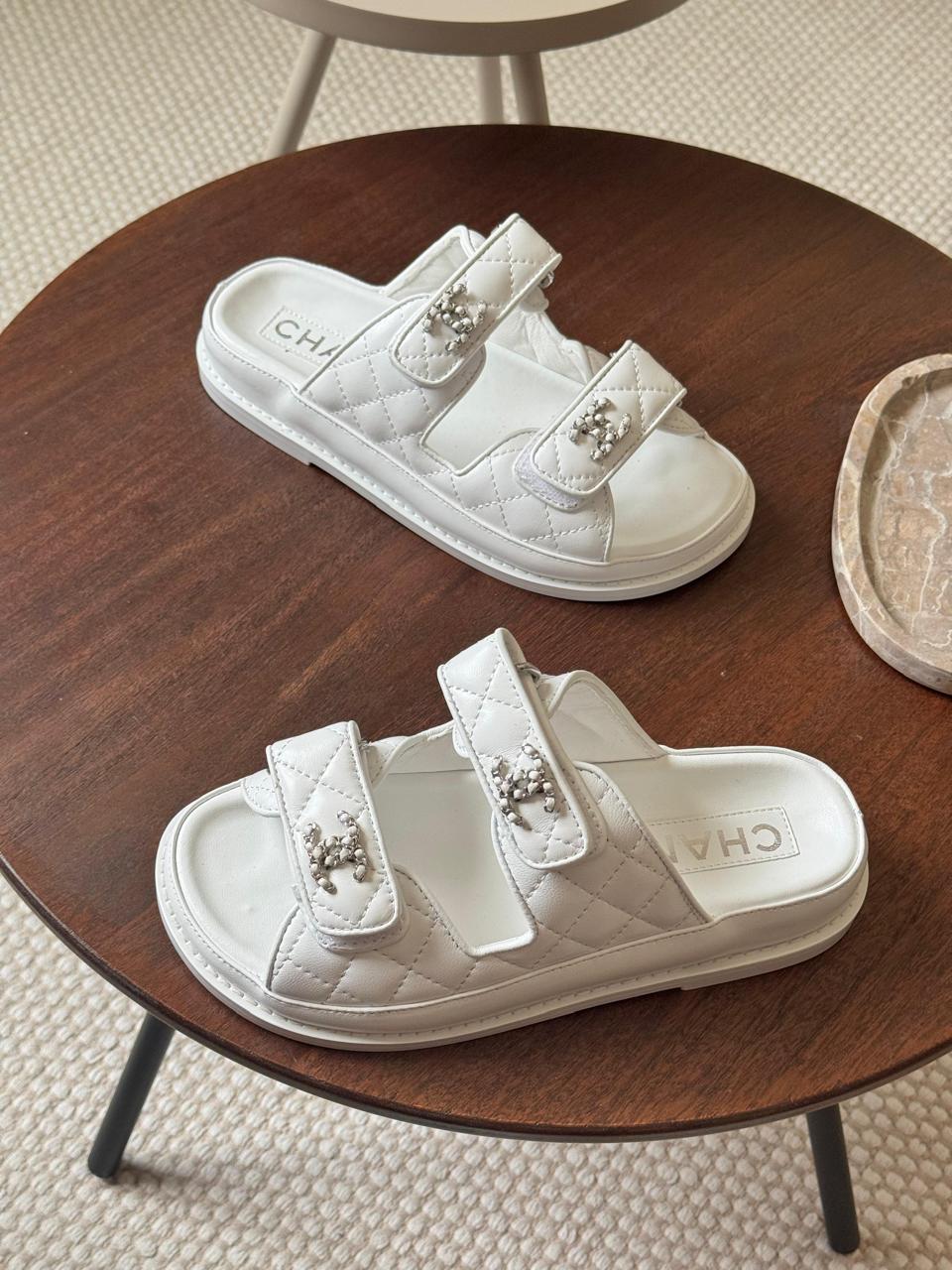 Chanel slippers & chanel sandals. -white